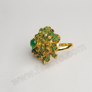 A 24 carat gold polish regal radiance green ring Zircon